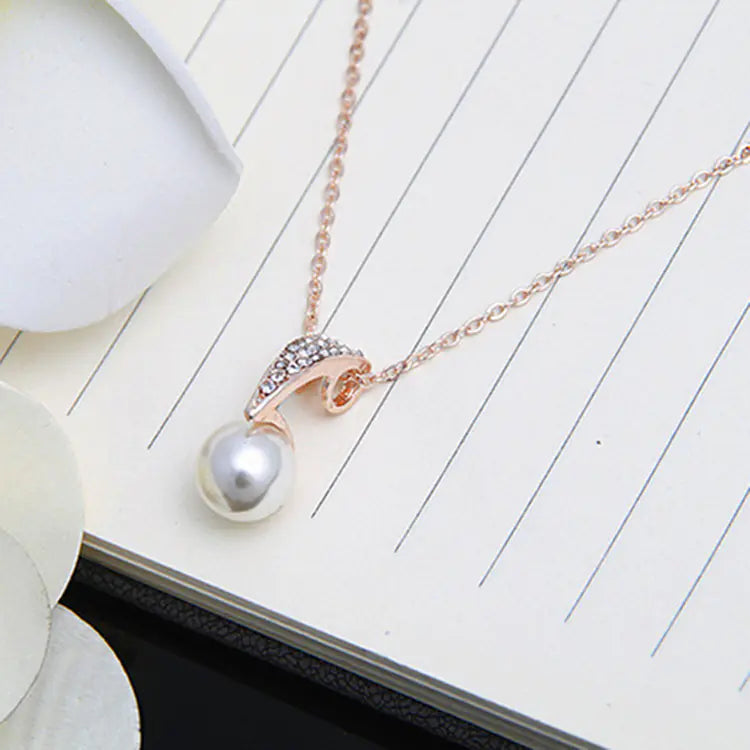 Pearl Necklace Set with Teardrop Design and Rhinestones
